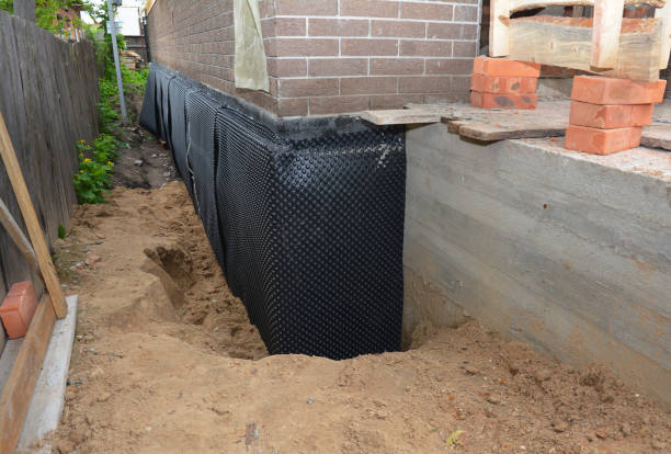 Happy homeowners after waterproofing job in Signal Mountain